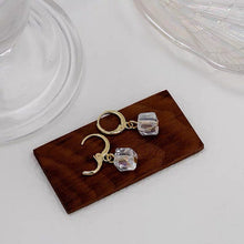 Load image into Gallery viewer, Minimalist 18K gold plated earrings featuring 6mm mini sugar cube stones in clear and champagne colors.
