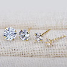 Load image into Gallery viewer, A pair of 14K solid gold stud earrings with cubic zirconia stones available in 3mm, 4mm, and 5mm sizes.