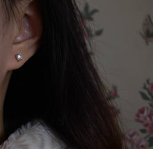 Load image into Gallery viewer, A pair of 14K solid gold stud earrings with cubic zirconia stones available in 3mm, 4mm, and 5mm sizes.