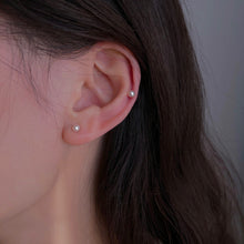 Load image into Gallery viewer, A pair of 14K solid gold earrings featuring lustrous AAA-grade button freshwater pearls, known for their exceptional quality and shine.