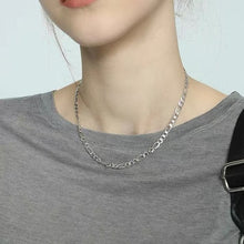 Load image into Gallery viewer, Minimalist solid stainless steel necklace with a trendy Figaro chain design, adjustable 16-18 inches, hypoallergenic and stylish.