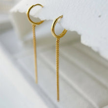 Load image into Gallery viewer, 18K gold-plated hoop earrings with 16mm hoop and tassel chains, measuring 6cm in length. Minimalist design suitable for casual or formal wear.