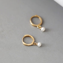 Load image into Gallery viewer, 18K gold-plated hoop earrings with 16mm hoop and small 3mm freshwater button pearls. Elegantly designed for casual or formal wear.