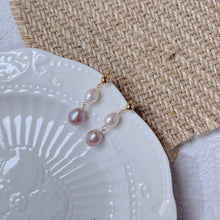 将图片加载到图库查看器,18K gold plated earrings with AAA-grade white and purple oval freshwater pearls, hypoallergenic and elegant.