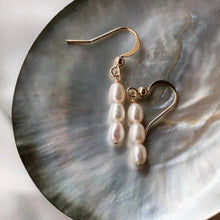 Load image into Gallery viewer, Minimalist dainty earrings with 5mm freshwater pearl bar design, gold plated, hypoallergenic and elegant.