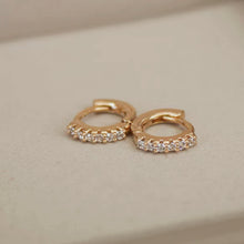 Load image into Gallery viewer, A trio of 18K Gold Plated S925 Huggies in 8mm, 10mm, and 12mm sizes, made from sterling silver and plated with 18K gold.