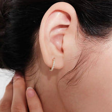 Load image into Gallery viewer, A trio of 18K Gold Plated S925 Huggies in 8mm, 10mm, and 12mm sizes, made from sterling silver and plated with 18K gold.