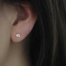 Load image into Gallery viewer, A pair of 14K solid gold stud earrings with cubic zirconia stones available in 3mm, 4mm, and 5mm sizes.