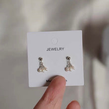 Load image into Gallery viewer, A pair of 18K Gold Plated or surgical steel stud earrings with AAA 4-5mm small oval natural pearls.