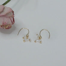 Load image into Gallery viewer, This description highlights the size, material, and design features of the earrings, emphasizing their elegance and versatility.