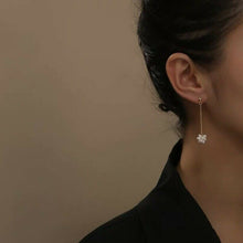 将图片加载到图库查看器,18K gold-plated earrings with small 3-4mm baroque freshwater pearls wire wrapped along a chain. Total length of 6cm, ideal for weddings and formal occasions.