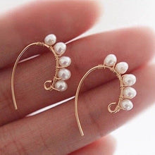 Load image into Gallery viewer, 18K gold-plated earrings with 4mm button pearls wire wrapped. Hook style for easy wear, adding sophistication to any outfit.