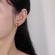 Load image into Gallery viewer, A pair of 18K Gold Plated steel ear wire earrings with 4mm faceted garnet beads in a floral wire-wrapped design.