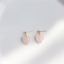 Load image into Gallery viewer, Earrings with 10mm Mozambique heart rose quartz, available in 18K gold-plated or silver stainless steel settings. Hypoallergenic and stylish.