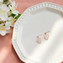 Load image into Gallery viewer, Earrings with 10mm Mozambique heart rose quartz, available in 18K gold-plated or silver stainless steel settings. Hypoallergenic and stylish.