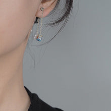 Load image into Gallery viewer, Dazzling earrings featuring stainless steel rainbow clear AB sugar cube beads in 6mm or 8mm sizes, with a 4cm length for a playful dangle effect.