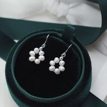 Load image into Gallery viewer, A pair of 18K Gold Plated, surgical steel, or silver dangle earrings with 3mm baroque pearls in a flower circle design. 4o