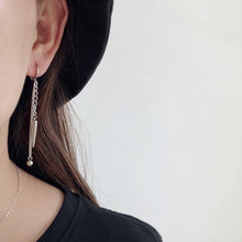 Load image into Gallery viewer, A pair of BTS Style Inspired Bullet Spike Earrings, 6-7cm in length, made of surgical steel, available in lever-back and stud styles. The design features sleek bullet spikes for an edgy, punk-inspired look.