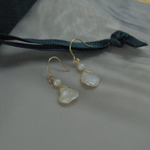 Load image into Gallery viewer, 18k gold plated dangle earrings with 3mm button pearls and 8mm keshi pearls, hypoallergenic and elegant.