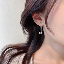 Load image into Gallery viewer, Dazzling earrings featuring stainless steel rainbow clear AB sugar cube beads in 6mm or 8mm sizes, with a 4cm length for a playful dangle effect.