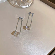 Load image into Gallery viewer, Dazzling earrings featuring stainless steel rainbow clear AB sugar cube beads in 6mm or 8mm sizes, with a 4cm length for a playful dangle effect.