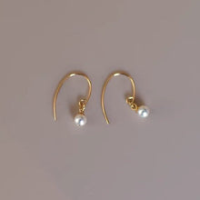 Load image into Gallery viewer, 18K gold plated earrings with AAA-grade 7mm South Sea pearls and delicate flower bead caps, perfect for adding a touch of timeless elegance to any outfit.