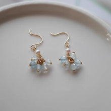 Load image into Gallery viewer, A pair of 18K Gold Plated or surgical steel stud earrings with AAA 4-5mm small oval natural pearls.