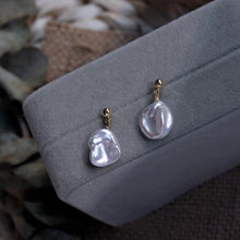 Load image into Gallery viewer, A pair of 18K Gold Plated or silver steel stud earrings with large 10-11mm milky white freshwater Keshi pearls.