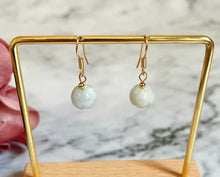 将图片加载到图库查看器,A pair of 18K Gold Plated or S925 Silver earrings with 10mm light green pumpkin jade jadeite gemstones.
