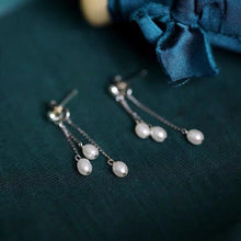 Load image into Gallery viewer, A pair of 18K Gold Plated or surgical steel earrings with 4-5mm oval AAA freshwater pearls, 5cm in length, ideal for wedding bridal and bridesmaid gifts.