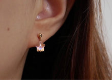 Load image into Gallery viewer, 18K gold plated or surgical steel earrings with 8mm clear AB love heart rainbow glass colored glaze lampwork beads, perfect for adding a touch of whimsy and charm to any outfit.