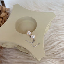 Load image into Gallery viewer, 18K gold plated or steel dangle earrings with 8-8.5mm freshwater AAA off round white pearls, perfect for adding a touch of timeless beauty and sophistication to any outfit.