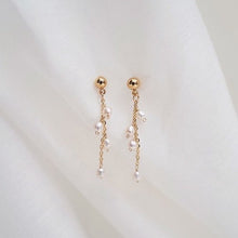 Load image into Gallery viewer, 18K gold plated or surgical steel earrings with a 16mm natural mother of pearl butterfly design and AAA 4mm pearls, perfect for a wedding gift or special occasion.