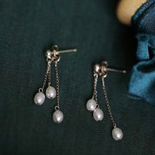 Load image into Gallery viewer, A pair of 18K Gold Plated or surgical steel earrings with 4-5mm oval AAA freshwater pearls, 5cm in length, ideal for wedding bridal and bridesmaid gifts.