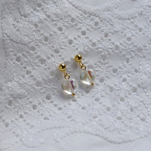 Load image into Gallery viewer, 18K gold plated or surgical steel earrings with 8mm clear AB love heart rainbow glass colored glaze lampwork beads, perfect for adding a touch of whimsy and charm to any outfit.