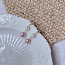Load image into Gallery viewer, 18K gold plated or steel earrings with white and purple AAA oval freshwater pearls, perfect for adding a touch of sophistication and color to any outfit.