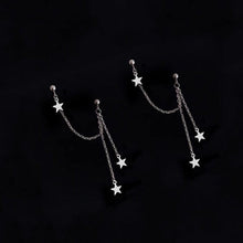 Load image into Gallery viewer, Surgical steel double piercing chain earrings with a 10mm star charm and 7cm length, perfect for a unique and stylish look.