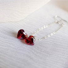 Load image into Gallery viewer, 18K gold plated or surgical steel dangle earrings with 6mm cubic zirconia red hearts, perfect for adding a touch of romance and glamour to any outfit.