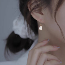Load image into Gallery viewer, A pair of 18K Gold Plated or surgical steel earrings with white Champaca flower designs made from mother of pearl, measuring 8-9mm.