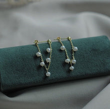 Load image into Gallery viewer, A pair of 18K Gold Plated steel earrings with 3mm baroque natural pearls, measuring 4-4.5cm in length, ideal for weddings and bridesmaid gifts.