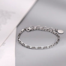 Load image into Gallery viewer, A dainty chain link bracelet with 4x2mm links, available in 6, 7, and 8 inches with an extender, offering a delicate and minimalist style.