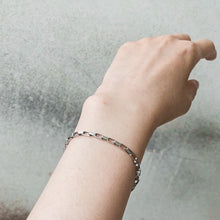 Load image into Gallery viewer, A dainty chain link bracelet with 4x2mm links, available in 6, 7, and 8 inches with an extender, offering a delicate and minimalist style.