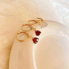 Load image into Gallery viewer, 18K gold plated steel hoop earrings with a 6mm garnet heart-shaped zirconia and white round zirconia accents, perfect for adding a touch of elegance and sparkle to any outfit.