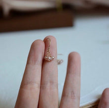 Load image into Gallery viewer, 18K gold-plated earrings with tiny 2-3mm purple pearls. Dainty and elegant, ideal for adding a pop of color to your look.