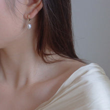 Load image into Gallery viewer, 18K gold plated oval hoop earrings with 7-8mm natural baroque pearls, perfect for adding a touch of natural elegance to any outfit.
