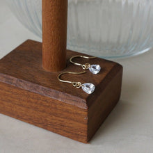 将图片加载到图库查看器,A pair of 18K gold plated dangle earrings featuring 6x8mm pear cut zirconia crystals, designed with minimalist ear wires for an elegant and sparkling look.
