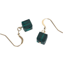 Load image into Gallery viewer, A pair of 18K gold plated dangle earrings featuring 6mm sugar cube green beads, offering a vibrant touch to the sophisticated gold setting.