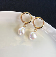 Load image into Gallery viewer, 18K gold plated dangle earrings with 8mm jade beads, perfect for adding a touch of sophistication and color to any outfit.