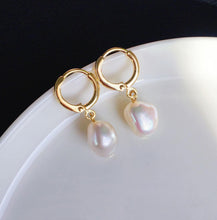 Load image into Gallery viewer, 18K gold plated dangle earrings with 8mm jade beads, perfect for adding a touch of sophistication and color to any outfit.