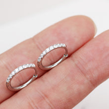 Load image into Gallery viewer, Hoop earrings made from 316 surgical steel, available in 8mm, 10mm, or 12mm sizes.
